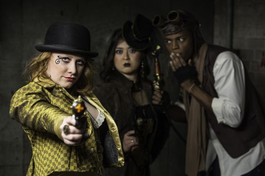 Steam Punks in Underground Lair with Weapon