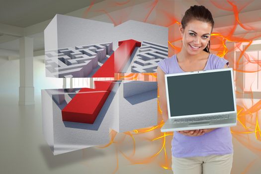 Smiling young female with her laptop against abstract design in orange