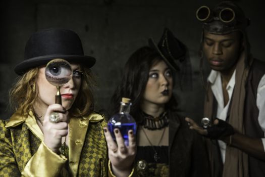 Steam Punks in Underground Lair with Potion and Magnifying Glass