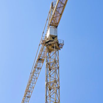 crane on blue sky background