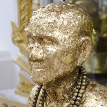gold Buddha statue in Thailand temple
