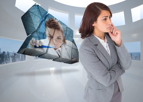 Worried businesswoman against bright white room with windows