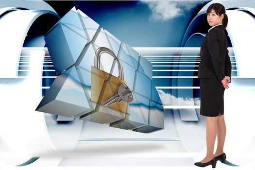 Serious businesswoman against abstract cloud design in futuristic structure