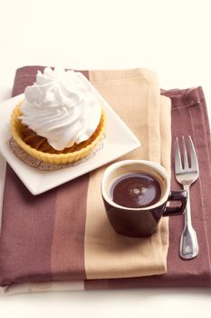 Coffee and cake with whipped cream