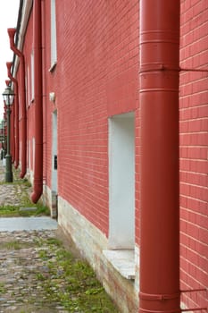 facade of a building of red brick