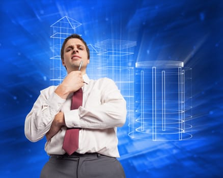 Thoughtful businessman holding pen to chin against abstract blue squares