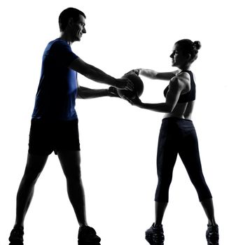 couple woman man exercising workout fitness aerobics posture in silhouette studio isolated on white background