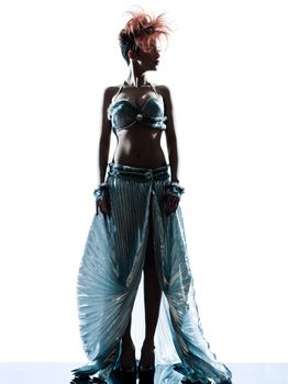 funky young woman with transparency silk dress in studio isolated on white background