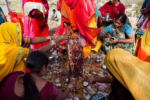 Rajasthan, India - March 21 : woman of the countryside are celebrating the god who protect them in the Gangaur festival one of the most important of the year on march 21st 2009 at Rajasthan, India