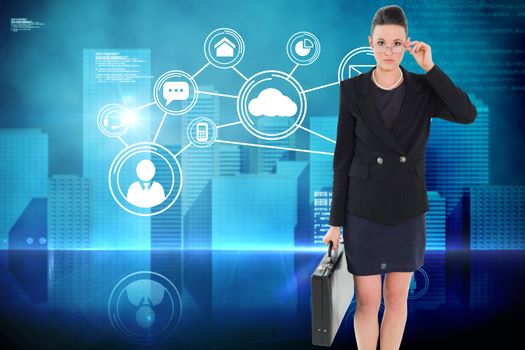 Elegant businesswoman in suit carrying briefcase against futuristic technology interface