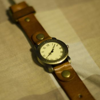 classic Wristwatch on brown tone color background