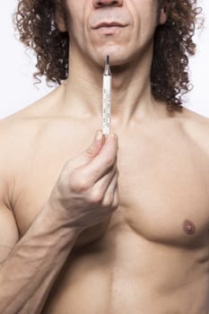 Cropped portrait of mediterranean looking man holding a mercury thermometer