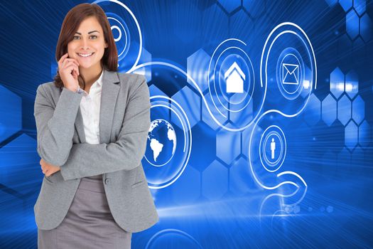 Smiling thoughtful businesswoman against futuristic technology interface