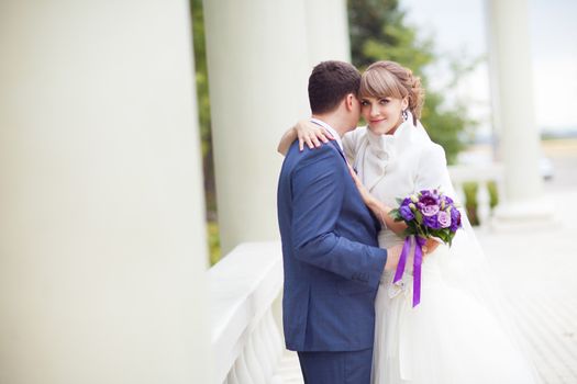 couple near the columns