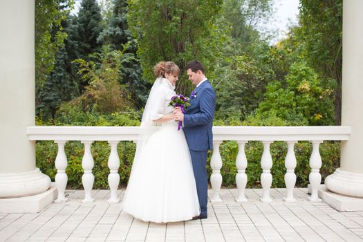 couple near the columns