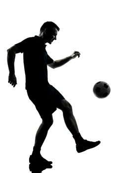 one man soccer player in studio silhouette isolated on white background