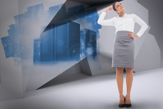 Smiling thoughtful businesswoman against abstract screen in room showing server towers