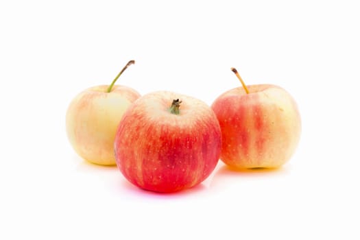 small red and yellow apples isolated on white background