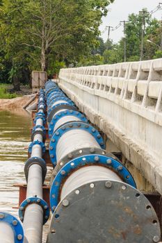 A big water supply main pipeline with irrigation.