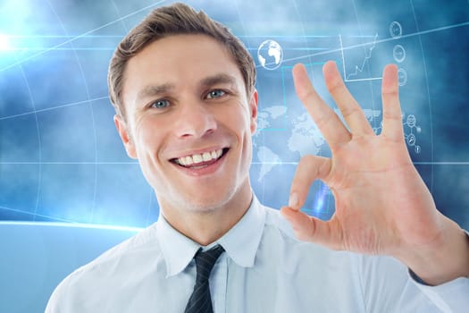 Businessman showing ok sign against futuristic technology interface