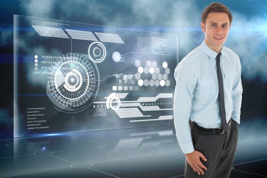 Happy businessman standing with hand in pocket against futuristic technology interface