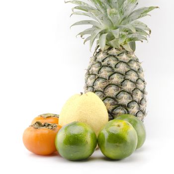 pineapple chinese pear persimon and green orange isolatedon white background