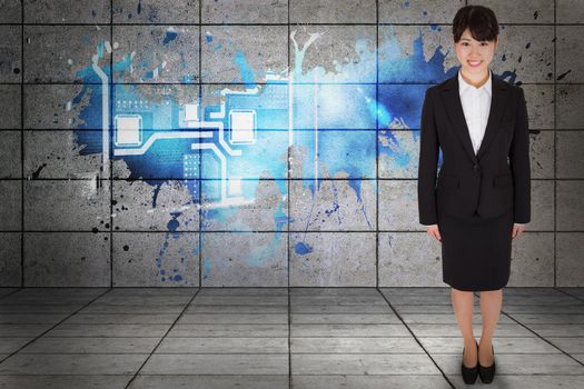 Smiling businesswoman against splash on wall revealing technology interface