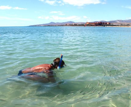 scuba diver on surface