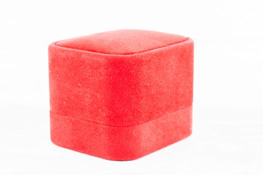 Red jewelry box to putting ring on white background
