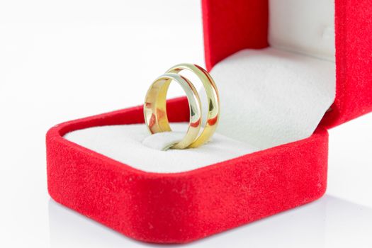 pair ring in a gift red box on white background