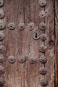 detail of and old and aged door and lock