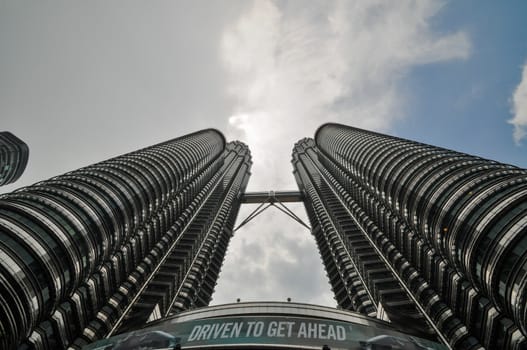 KUALA LUMPUR - APRIL 10: General view of Petronas Twin Towers on Apr 10, 2011 in Kuala Lumpur, Malaysia. The towers are the worlds tallest twin towers with the height of 451.9m.