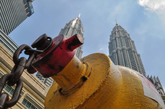 KUALA LUMPUR - APRIL 10: General view of Petronas Twin Towers on Apr 10, 2011 in Kuala Lumpur, Malaysia. The towers are the worlds tallest twin towers with the height of 451.9m.