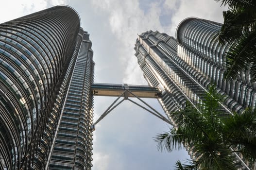 KUALA LUMPUR - APRIL 10: General view of Petronas Twin Towers on Apr 10, 2011 in Kuala Lumpur, Malaysia. The towers are the worlds tallest twin towers with the height of 451.9m.