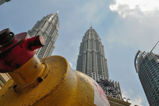 KUALA LUMPUR - APRIL 10: General view of Petronas Twin Towers on Apr 10, 2011 in Kuala Lumpur, Malaysia. The towers are the worlds tallest twin towers with the height of 451.9m.