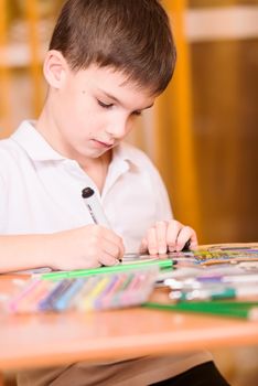 Concentrated boy colouring book