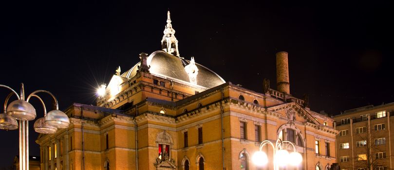 National theatre in Oslo at night winter