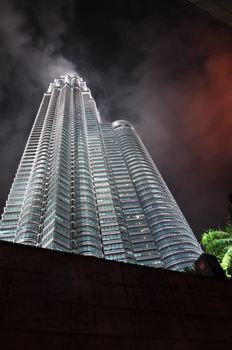 KUALA LUMPUR - APRIL 10: General view of Petronas Twin Towers  at night on Apr 10, 2011 in Kuala Lumpur, Malaysia. The towers are the worlds tallest twin towers with the height of 451.9m.