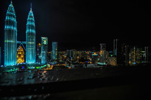 KUALA LUMPUR - APRIL 10: General view of Petronas Twin Towers  at night on Apr 10, 2011 in Kuala Lumpur, Malaysia. The towers are the worlds tallest twin towers with the height of 451.9m.