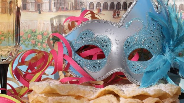 Carnival mask with glitters and pancakes