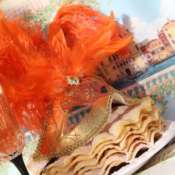 Orange carnival mask with pancakes