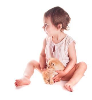 baby girl and kitten isolated on white background