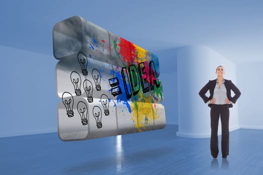 Happy businesswoman against idea graphic on abstract screen in room