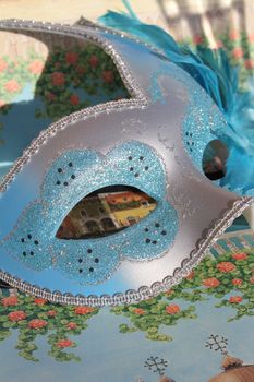Blue carnival mask with glitters