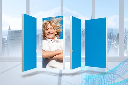 Blonde boy on abstract screen against blue wave design in a room
