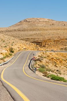 Winding Asphalt Road in the Negev Desert in Israel