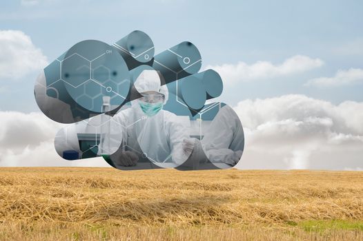 Scientist on abstract screen against bright brown landscape