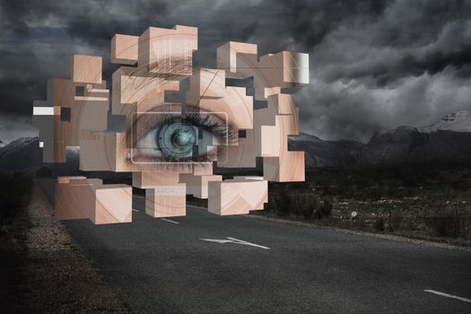 Eye analysis on abstract screen against landscape with stormy sky