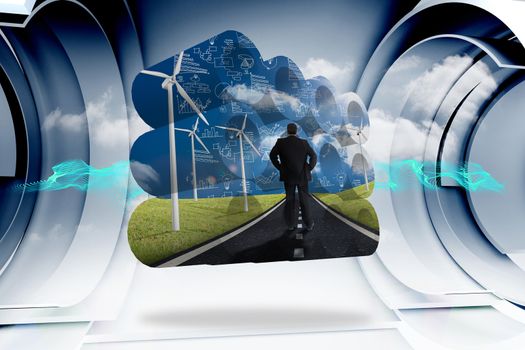 Businessman on road on abstract screen against abstract blue cloud design in futuristic structure