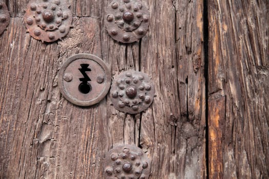 detail of and old and aged door and lock